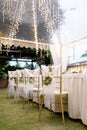 Gold chiavari chair decorate with a flower on a wedding day