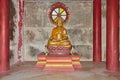 Gold Chinese Buddha Statue Show Upside Down Palm on Concrete Base