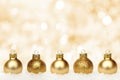 Gold Christmas background with baubles in snow Royalty Free Stock Photo