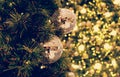 Gold Christmas background of de-focused lights with decorated tree Royalty Free Stock Photo