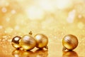 Gold Christmas balls on the shiny background Royalty Free Stock Photo