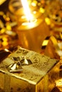 Gold christmas candles and gold gift boxes Royalty Free Stock Photo