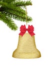 Gold Christmas decor bell with red bow on green tree isolated on Royalty Free Stock Photo