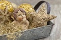 Gold Christmas Decoration With Little Cherub