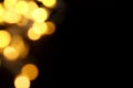Gold Christmas lights soft focus bokeh background with copy space