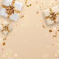 Gold Christmas and New Year background with Xmas gift boxes, fir branches, gold ribbon, decoration, sparkles, confetti, bokeh. Royalty Free Stock Photo