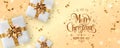 Gold Christmas and New Year Text on gold Xmas background with gift boxes, fir branches, gold ribbon, decoration, sparkles, Royalty Free Stock Photo