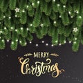 Gold Christmas and New Year Typographical on dark background with fir branches, lights, Xmas decorations glowing white garlands. Royalty Free Stock Photo