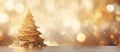 A gold christmas tree decorates a wooden table under the sky Royalty Free Stock Photo
