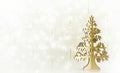 Gold Christmas tree and white wall background