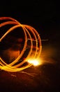 Gold circle light effect out of bonfire Royalty Free Stock Photo