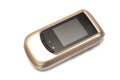 Gold clam-shell flip phone Royalty Free Stock Photo