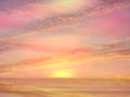 Beautiful gold  pink sunset at sea  water reflection sun light on  gold yellow  clouds sky  nature background Royalty Free Stock Photo