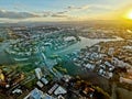 GOLD COAST, AUSTRALIA - APRIL 25, 2021: Aerial panorama view of High-rise building sky scrapers with inland island and Surfer