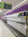 Supermarket empty baby needs shelves amid coronavirus fears, shoppers panic buying and stockpiling baby essentials Royalty Free Stock Photo