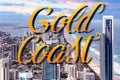 Gold Coast hand lettering over Skyscrapers right next to the ocean beach - Surfers Paradise, Gold Coast, Australia. Royalty Free Stock Photo