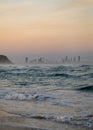 The Gold Coast Skyline in Australia from a Beach at Sunrise Royalty Free Stock Photo