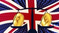 Gold coin of Bitcoin BTC and british pound GBP on scales and colored flag of Great Britain on background. Central Bank of England