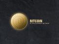 A gold coin with a bitcoin sign on a black leather background Royalty Free Stock Photo