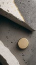 A gold coin on a gray surface. A gold bar. Abstraction. Wallpaper. Generated by AI.