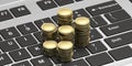 Gold coin stacks on a computer keyboard background. 3d illustration