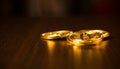 Gold coins of bitcoins on an office table on a dark background Royalty Free Stock Photo