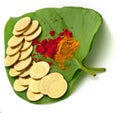 Gold coins kept on betel leaf