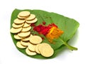 Gold coins kept on betel leaf