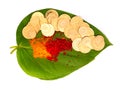 Gold coins kept on betel leaf