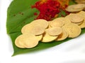 Gold coins kept on betel leaf