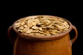 Gold coins in the vintage pot Royalty Free Stock Photo