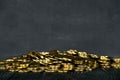 Gold coins on a wooden table. Money on a black background.Copy space. Treasure Hunt.Chalk rubbed out on blackboard Royalty Free Stock Photo