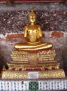 Gold color Buddha statue in Buddhist temple Royalty Free Stock Photo