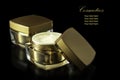 Gold colored blank cosmetic container for face cream moisturizer Royalty Free Stock Photo