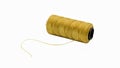 front view of a spool of gold embroidery thread isolated on white background. made from polyester Royalty Free Stock Photo