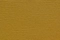 Gold colored plain textured cardstock background.