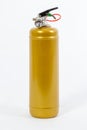 Gold Colored retro fire extinguisher isolated on white background Royalty Free Stock Photo