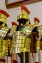 Gold-colored Roman armor in the city Gerona of Spain, 13 May 2017 Royalty Free Stock Photo