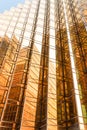 Gold colour office building tower facade in business center Royalty Free Stock Photo