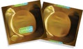 Gold condom packet. Royalty Free Stock Photo
