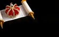 A Gold Coronation Crown with Red Velevet on a Bible on an Open Hebrew Scroll Royalty Free Stock Photo