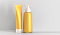 Gold cosmetic bottles mockup, 3d render. Luxury cosmetics tubes for essence, oil, cream, lotion, soap or shampoo. Golden