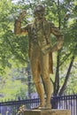 A gold-covered statue of Thomas Paine is found in the Parc Montsouris along the Boulevard Jourdan in the 14th arr.; the inscriptio Royalty Free Stock Photo