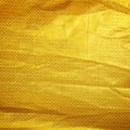 Gold creased fabric silk Royalty Free Stock Photo