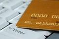 Gold Credit Card on a Keyboard Royalty Free Stock Photo