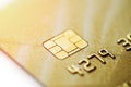 Gold credit card with micro chip selective focus Royalty Free Stock Photo