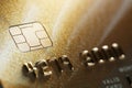 Gold credit card with micro chip selective focus Royalty Free Stock Photo