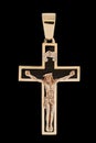 Gold cross pendant with crucifix Royalty Free Stock Photo