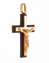 Gold cross pendant with a crucifix Royalty Free Stock Photo