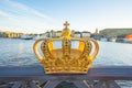 Gold crown on skeppsholmen bridge in Stockholm city, Sweden Royalty Free Stock Photo